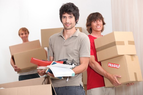 Household movers packing belongings in Chelsea