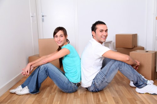 Preparing furniture for safe storage in Chelsea with wrapping materials